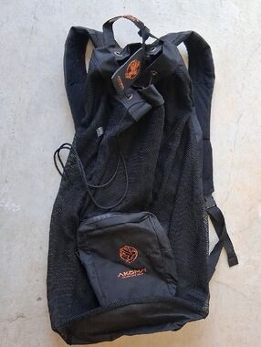 Akona Black Mesh Dive Backpack with Orange Logo